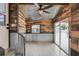 Inviting entryway with rustic wood walls and tile floors at 126 90Th Ave, Treasure Island, FL 33706
