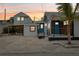 Modern home with blue door, gray roof, and carport at 126 90Th Ave, Treasure Island, FL 33706