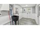 Laundry room featuring a utility sink and exterior access at 126 90Th Ave, Treasure Island, FL 33706