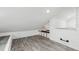 Spacious loft bedroom with built-in sleeping platform and white shiplap walls at 126 90Th Ave, Treasure Island, FL 33706