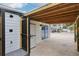 Outdoor shower with modern design and privacy gate at 126 90Th Ave, Treasure Island, FL 33706