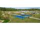Aerial view of a community park with various amenities at 13038 Paddock Woods Pl, Riverview, FL 33579