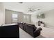 Game room featuring a large TV and comfortable seating at 13038 Paddock Woods Pl, Riverview, FL 33579