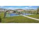 Two pickleball courts with a covered seating area at 13038 Paddock Woods Pl, Riverview, FL 33579