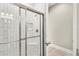 Clean and modern shower with subway tile at 13038 Paddock Woods Pl, Riverview, FL 33579