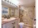 Updated bathroom with a large walk-in shower at 1488 Pine Glen Ln # B2, Tarpon Springs, FL 34688