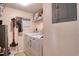 Laundry room with washer, dryer, and storage shelves at 1488 Pine Glen Ln # B2, Tarpon Springs, FL 34688