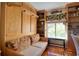 Home office with built-in wall bed and ample shelving at 1488 Pine Glen Ln # B2, Tarpon Springs, FL 34688