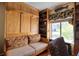 Home office with built-in bed, shelves, and window at 1488 Pine Glen Ln # B2, Tarpon Springs, FL 34688
