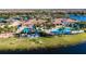 Aerial view of community pool and clubhouse at 15618 Aurora Lake Cir, Wimauma, FL 33598
