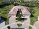 Bird's-eye view of a two-story house with a large yard at 15618 Aurora Lake Cir, Wimauma, FL 33598