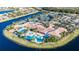 Community center with pools, tennis, and lake at 15618 Aurora Lake Cir, Wimauma, FL 33598