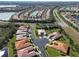 Aerial view showing a home's location in a quiet, residential area at 15618 Aurora Lake Cir, Wimauma, FL 33598
