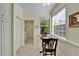 Small breakfast nook with table and chairs near kitchen at 15618 Aurora Lake Cir, Wimauma, FL 33598