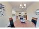 View of dining room, kitchen, and living room at 15618 Aurora Lake Cir, Wimauma, FL 33598