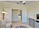 Home office with open door revealing a kitchen view at 15618 Aurora Lake Cir, Wimauma, FL 33598