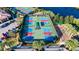 Aerial view of multiple pickleball courts at 15618 Aurora Lake Cir, Wimauma, FL 33598