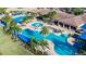 Aerial view of community pools and cabanas at 15618 Aurora Lake Cir, Wimauma, FL 33598