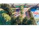 Shuffleboard courts nestled among palm trees at 15618 Aurora Lake Cir, Wimauma, FL 33598