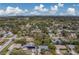 Aerial view of residential neighborhood with single-Gathering homes at 1566 Long St, Clearwater, FL 33755