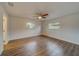 Bright bedroom with hardwood floors and multiple windows at 1566 Long St, Clearwater, FL 33755