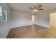 Spacious bedroom with hardwood floors and ceiling fan at 1566 Long St, Clearwater, FL 33755