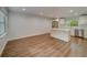 Open concept kitchen with island and modern finishes at 1566 Long St, Clearwater, FL 33755