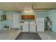 Laundry room inside garage with washer and dryer hookups at 1566 Long St, Clearwater, FL 33755