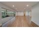 Spacious living area showcasing hardwood floors and ample natural light at 1566 Long St, Clearwater, FL 33755