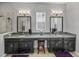 Double vanity bathroom with granite countertop at 16931 Scuba Crest St, Wimauma, FL 33598