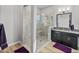 Walk-in shower with built-in seat at 16931 Scuba Crest St, Wimauma, FL 33598