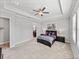 Main bedroom with en-suite bathroom access at 16931 Scuba Crest St, Wimauma, FL 33598