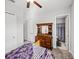 Bright bedroom with a dresser and en-suite bathroom at 16931 Scuba Crest St, Wimauma, FL 33598