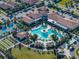 Aerial view of community pool, pickleball, and bocce ball at 16931 Scuba Crest St, Wimauma, FL 33598