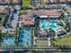 Resort-style pool, tennis courts, pickleball courts and clubhouse at 16931 Scuba Crest St, Wimauma, FL 33598