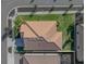 Aerial view of single-Gathering home with surrounding yard at 16931 Scuba Crest St, Wimauma, FL 33598