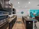 Modern kitchen with stainless steel appliances and granite countertops at 16931 Scuba Crest St, Wimauma, FL 33598
