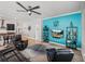 Open living space featuring comfortable seating and views into the kitchen at 16931 Scuba Crest St, Wimauma, FL 33598