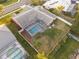 Aerial view showing house, pool, and backyard at 1811 Stonebrook Ln, Safety Harbor, FL 34695
