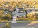 An aerial view showcasing a single-Gathering home in a residential neighborhood at 1811 Stonebrook Ln, Safety Harbor, FL 34695