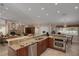 Gourmet kitchen boasts granite countertops, stainless steel appliances, and ample cabinetry at 1811 Stonebrook Ln, Safety Harbor, FL 34695