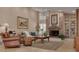 Living room with a fireplace and built in bookcases at 1811 Stonebrook Ln, Safety Harbor, FL 34695