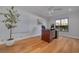 Home office features hardwood floors and a large desk at 1811 Stonebrook Ln, Safety Harbor, FL 34695