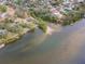 Aerial view showcasing waterfront property and neighborhood at 1841 Overbrook Ave, Clearwater, FL 33755