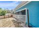 Backyard with a screened porch and outdoor shower at 1841 Overbrook Ave, Clearwater, FL 33755