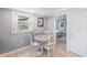Small dining area with white table and four chairs at 1841 Overbrook Ave, Clearwater, FL 33755