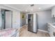 Bright kitchen with stainless steel appliances and white cabinets at 1841 Overbrook Ave, Clearwater, FL 33755