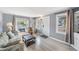 Bright living room with hardwood floors and ample natural light at 1841 Overbrook Ave, Clearwater, FL 33755