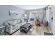 Cozy living room featuring a sofa, armchair, and coffee table at 1841 Overbrook Ave, Clearwater, FL 33755