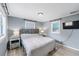 Spacious main bedroom with a king-size bed and wood headboard at 1841 Overbrook Ave, Clearwater, FL 33755